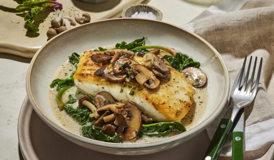 Creamy Halibut Marsala on a bed of Spinach and topped with Murshrooms.